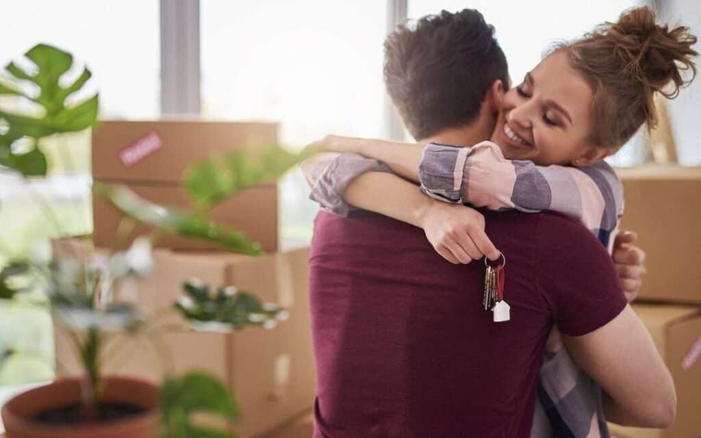 Happy couple after owning their own home